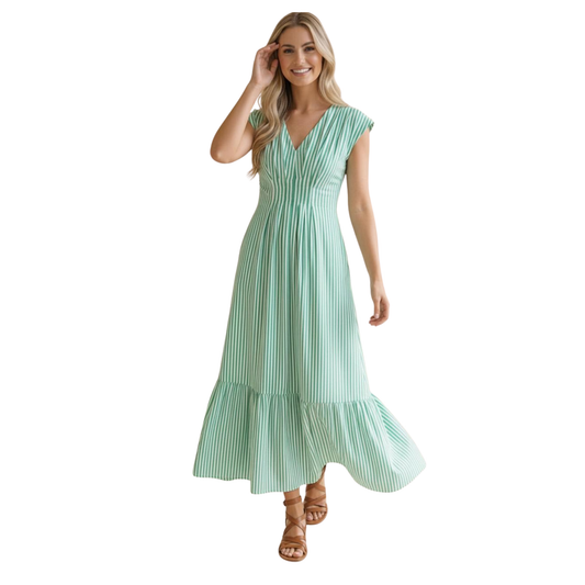 Effortless elegance meets everyday comfort in this Haptics striped maxi dress. The classic green and white stripes create a timeless look, while the flattering v-neckline and short sleeves offer a breezy, sophisticated silhouette. Perfect for casual outings, weekend brunches, or relaxed evenings, this maxi dress transitions seamlessly from day to night. The pleated design adds subtle dimension and movement, ensuring you look polished without sacrificing comfort. 