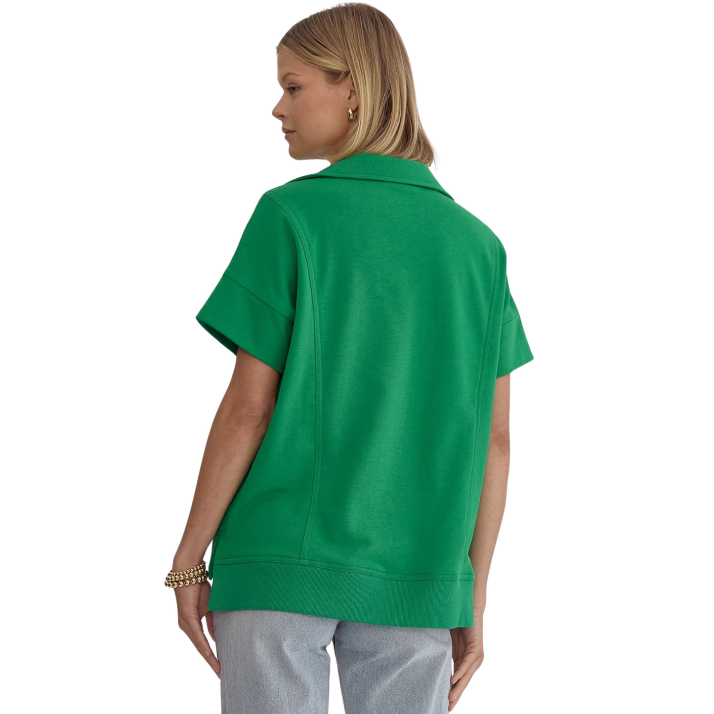 This solid short sleeve v-neck collared top is the perfect addition to your wardrobe. The split at the side hem adds a modern touch while the lightweight and non-sheer fabric ensures comfort and versatility. Complete your look with this essential piece.