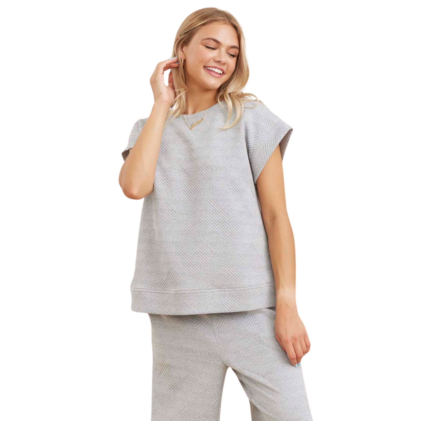 This heather grey top and bottom set features a textured U-neck top with short kimono sleeves and band hems. Made of lightweight, non-sheer fabric, this set offers comfort and style. Perfect for any occasion, a must-have for any wardrobe. Model is 5'8'' and is wearing a Small.
