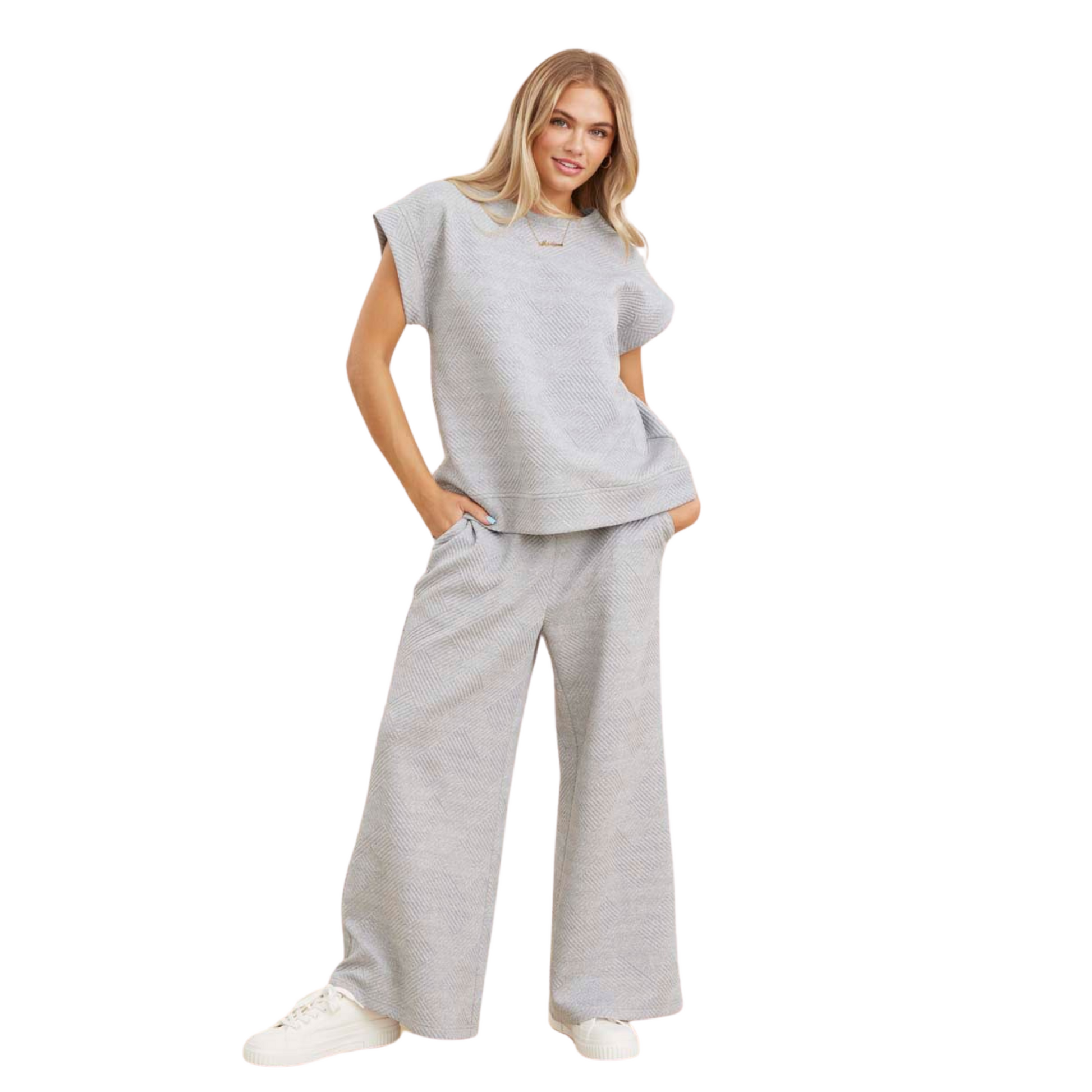 This heather grey top and bottom set features a textured U-neck top with short kimono sleeves and band hems. Made of lightweight, non-sheer fabric, this set offers comfort and style. Perfect for any occasion, a must-have for any wardrobe. Model is 5'8'' and is wearing a Small.