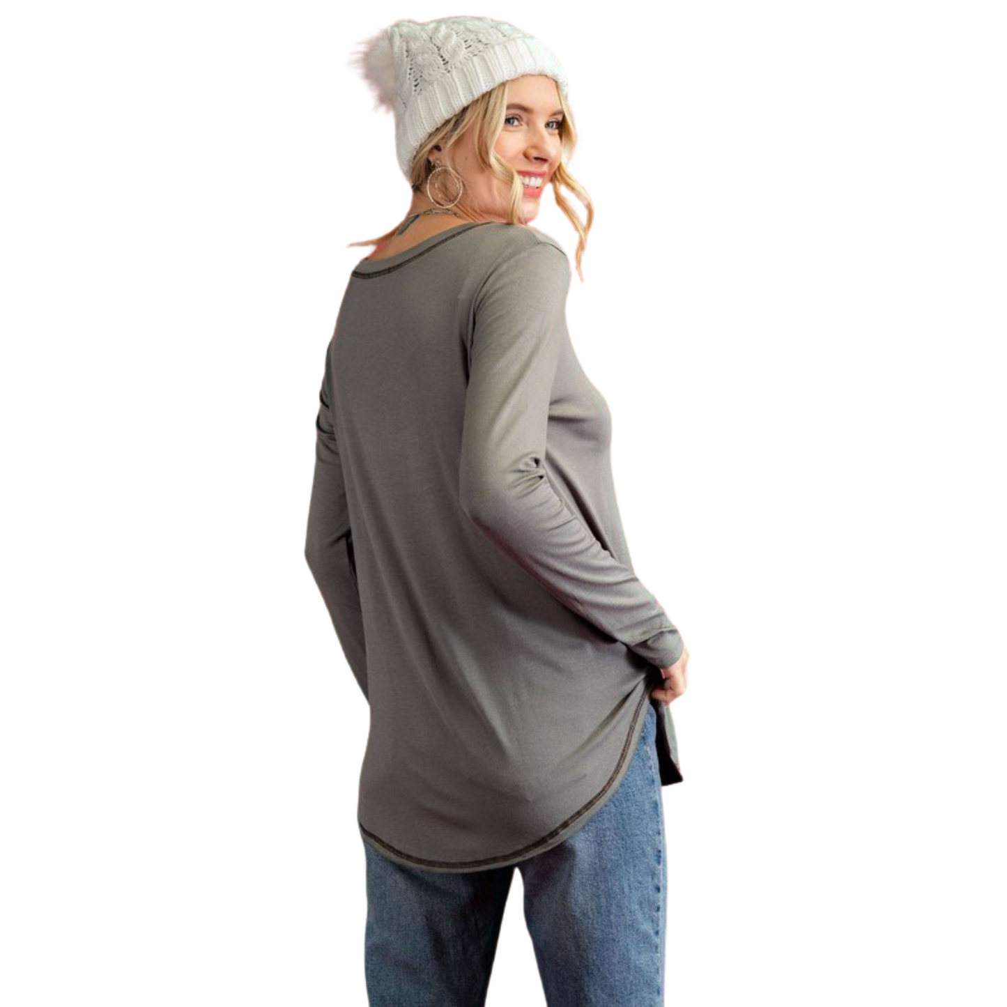 This lightweight plus-size top in a neutral grey hue is perfect for completing an easy, yet stylish look. Featuring a flattering v-neckline with stitch contrast detailing, long sleeves, and relaxed fit, this top will add a touch of effortless chicness to any ensemble.