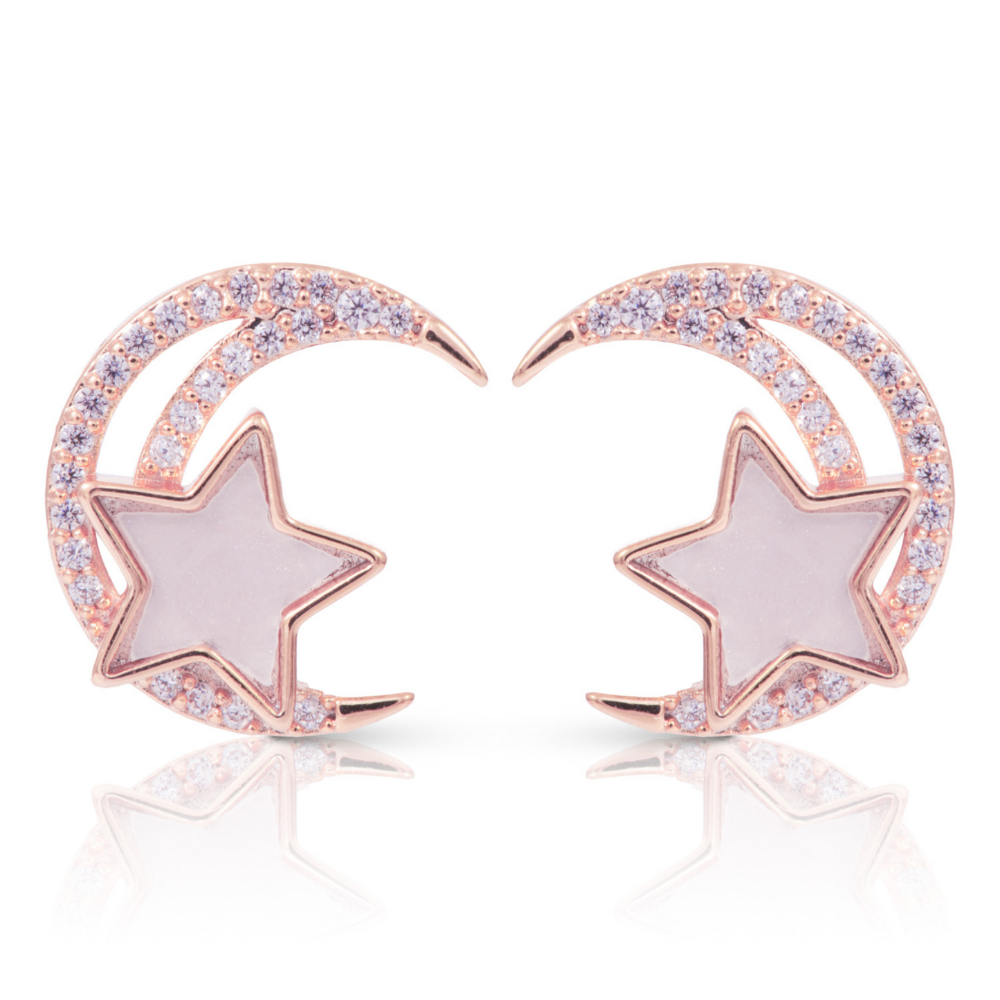 These elegant Half Moon and Star Earrings feature a delicate half moon and star design with sparkling rhinestone accents. Crafted in rose gold and secured with stud backs, these earrings are perfect for adding a touch of celestial beauty to any outfit.