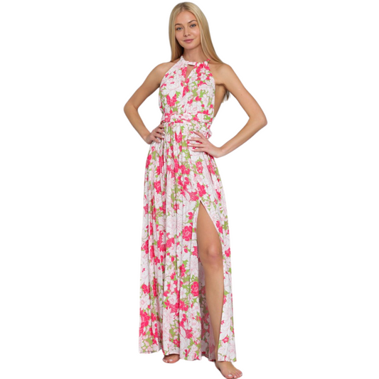 Expertly crafted with a halter top and backless design, this maxi dress is perfect for warm weather occasions. The stunning floral print in vibrant fuchsia and green adds a touch of elegance to this must-have piece. Embrace effortless style and comfort in this versatile dress.