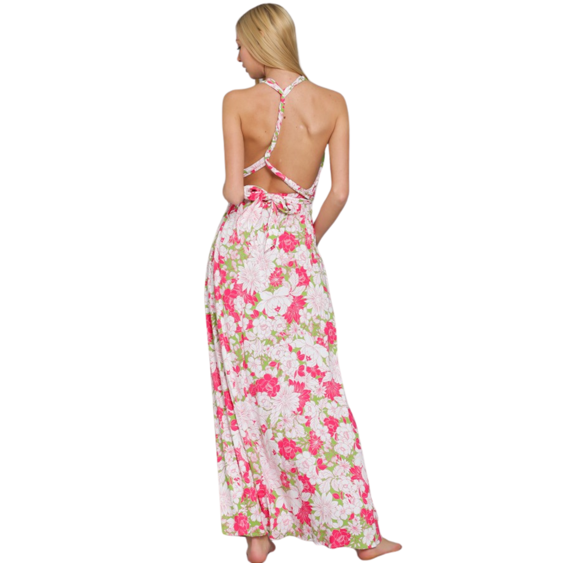 Expertly crafted with a halter top and backless design, this maxi dress is perfect for warm weather occasions. The stunning floral print in vibrant fuchsia and green adds a touch of elegance to this must-have piece. Embrace effortless style and comfort in this versatile dress.