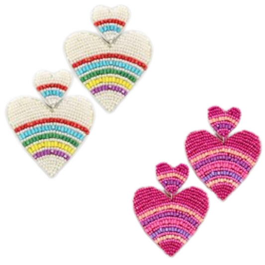 These heart-shaped earrings are a chic addition to your wardrobe. Show off your style with a subtle rainbow color or pink-beaded design. Their dangle design adds a touch of flair to any look.