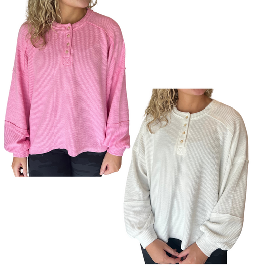 Update your wardrobe with this stylish plus size Button Long Sleeve Ribbed Top. It is made of comfortable ribbed knit fabric and is available in two colors - white and pink. Its long sleeves and button up design make it perfect for everyday wear.