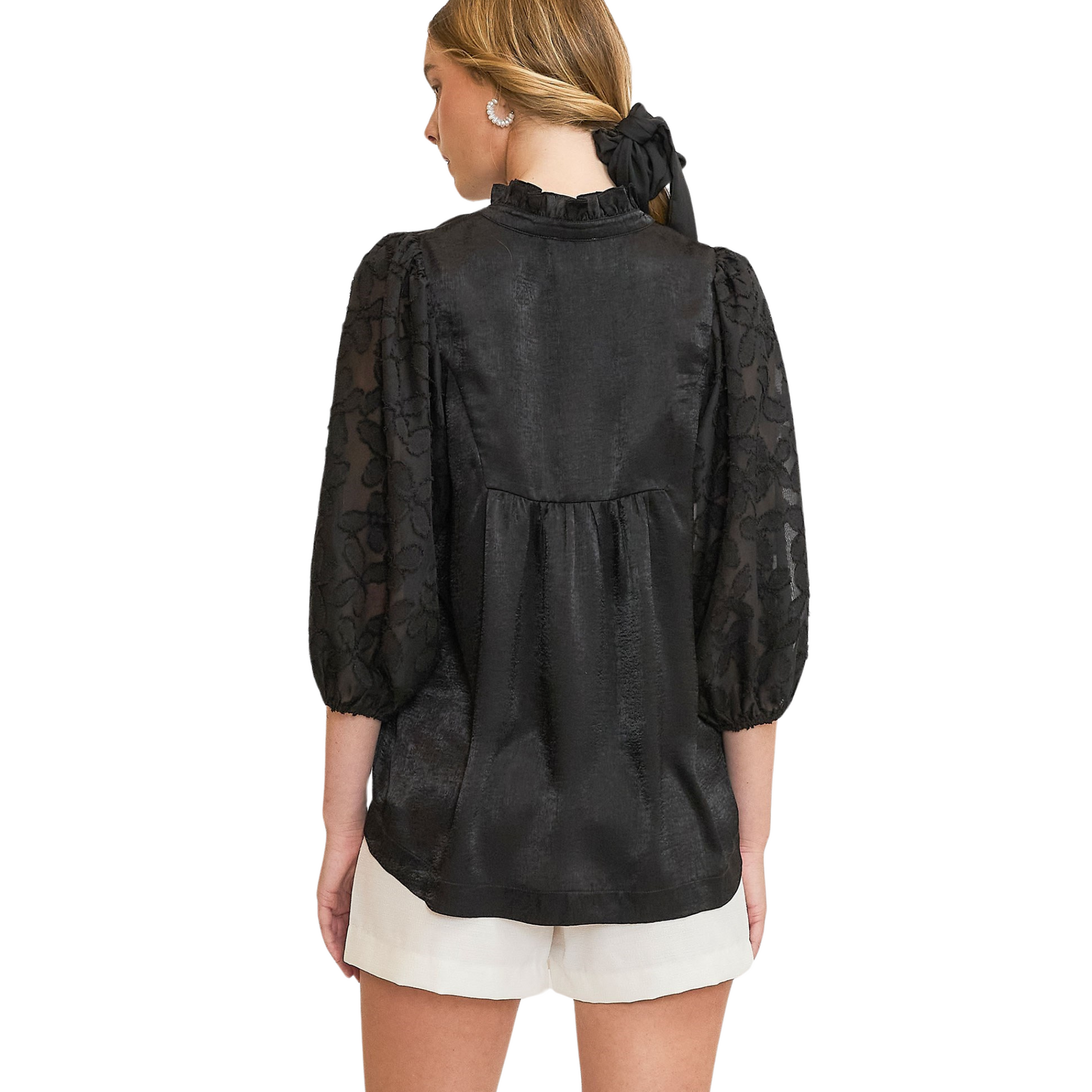 This elegant High Neck Satin Top by Umgee features a classic black color and delicate floral accent sleeves. Perfect for any occasion, this top exudes both style and sophistication. Elevate your wardrobe with this versatile piece that offers a luxurious look and comfortable fit.