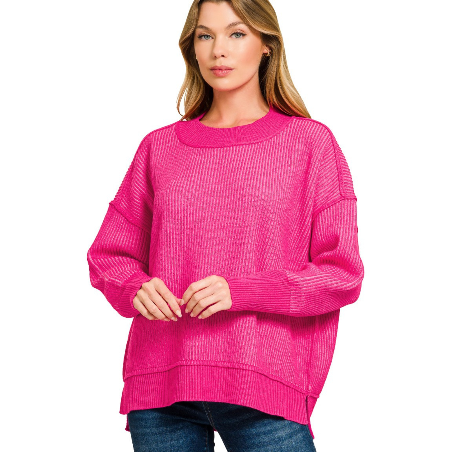 Exposed seam sweater in hot pink