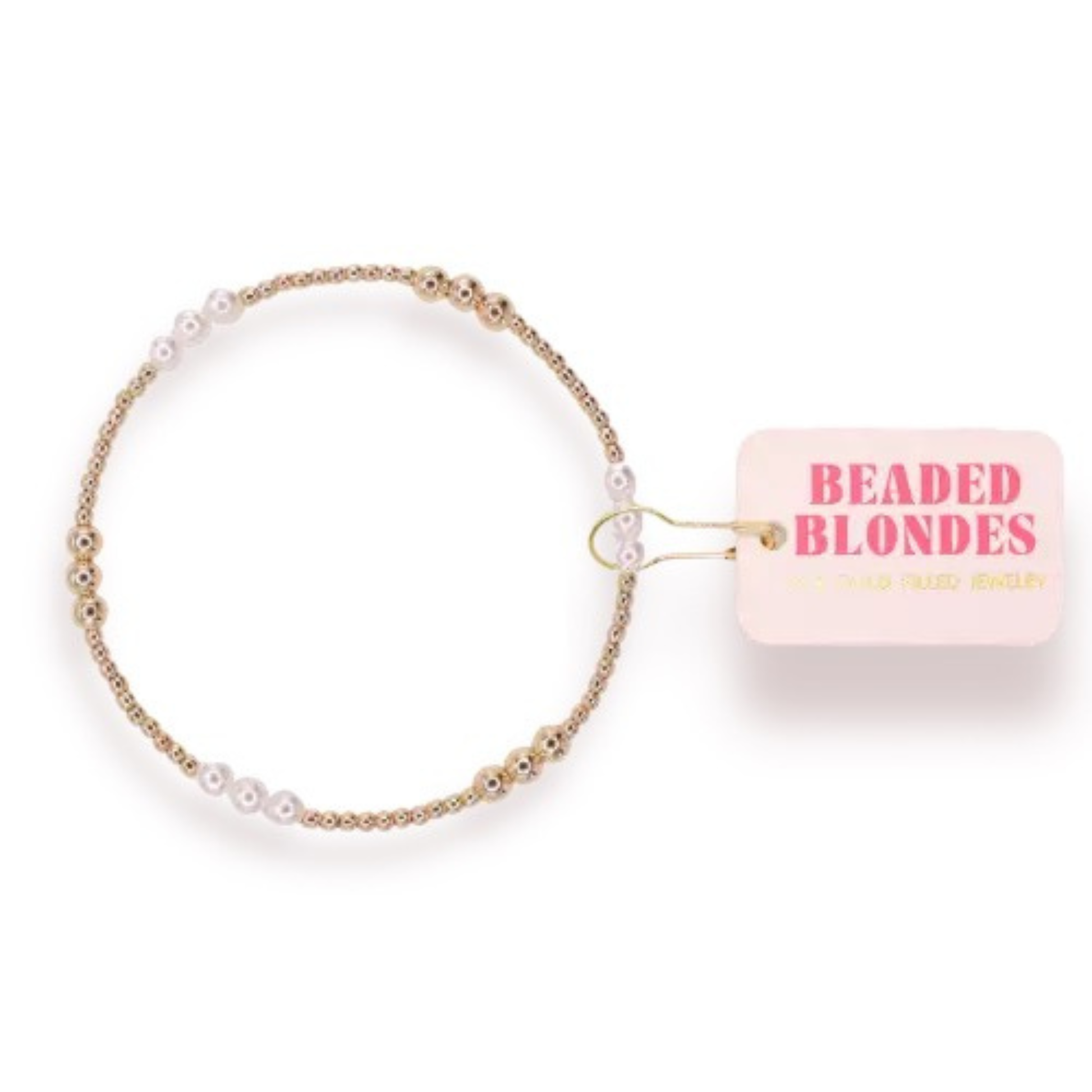 Elevate your everyday style with the ILY Gold Beaded Bracelet from Beaded Blondes. This stretchy bracelet features lustrous gold beads strung on a comfortable, flexible band that fits most wrists effortlessly. Perfect for layering or wearing solo, it adds a touch of warmth and sophistication to any outfit. The durable stretch design means all-day wear without worry. A timeless accessory that transitions seamlessly from casual to dressed up.