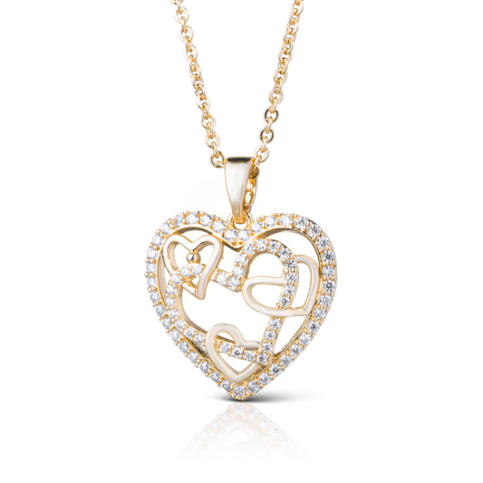 This Inset Hearts Necklace features a delicate, short design and multiple hearts crafted from high-quality gold. The rhinestone accents add a touch of sparkle to this elegant piece. Perfect for adding a touch of charm and sophistication to any outfit.