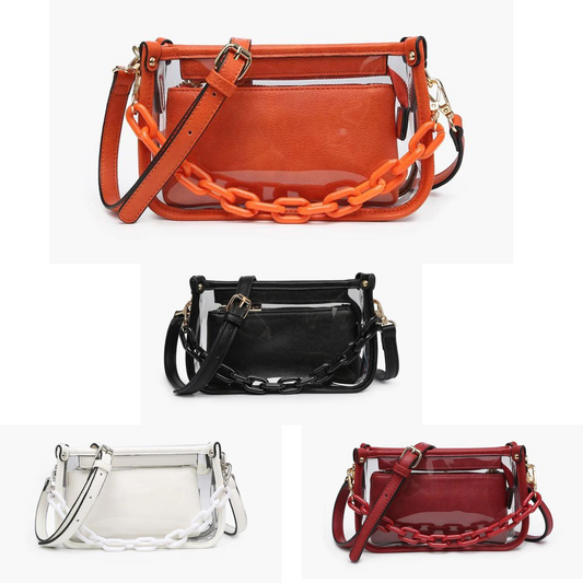 Introducing Jessica, your go-to companion for game days and beyond! This chic clear bag is designed to complement your stadium ensemble effortlessly. Featuring a stylish chain strap that perfectly matches its vegan leather trim, Jessica exudes sophistication and functionality in equal measure. What sets Jessica apart is its versatility - it includes an inner bag with a crossbody strap that can be used separately, offering maximum convenience