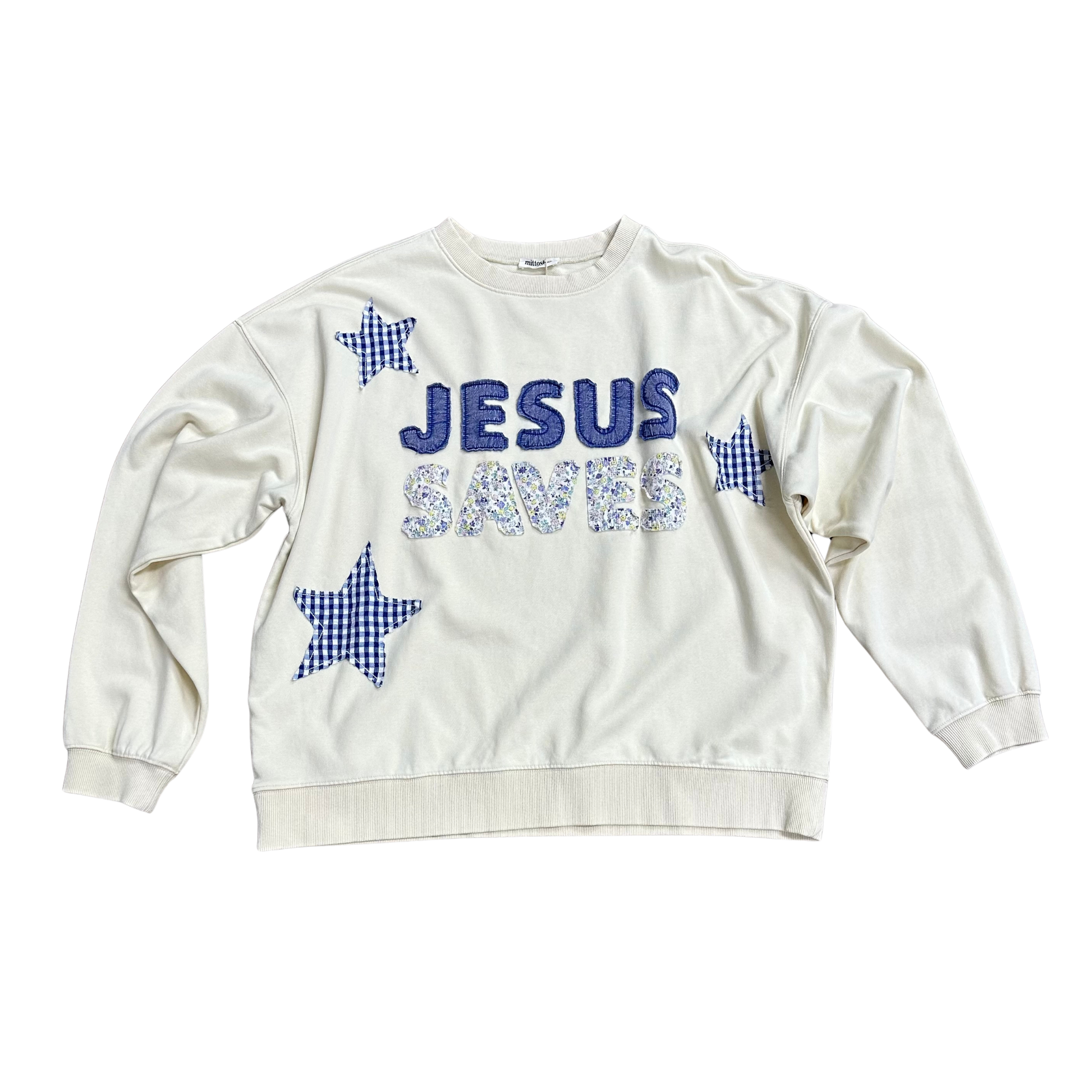 Embrace timeless style with this oat-colored long sleeve sweatshirt from Mittoshop, featuring a meaningful "Jesus Saves" graphic. The crew neck design offers classic comfort and versatility, making it an essential layering piece for any wardrobe. Crafted for durability and everyday wear, this sweatshirt combines quality construction with thoughtful design. Perfect for those seeking apparel that reflects both personal values and contemporary fashion sensibilities.