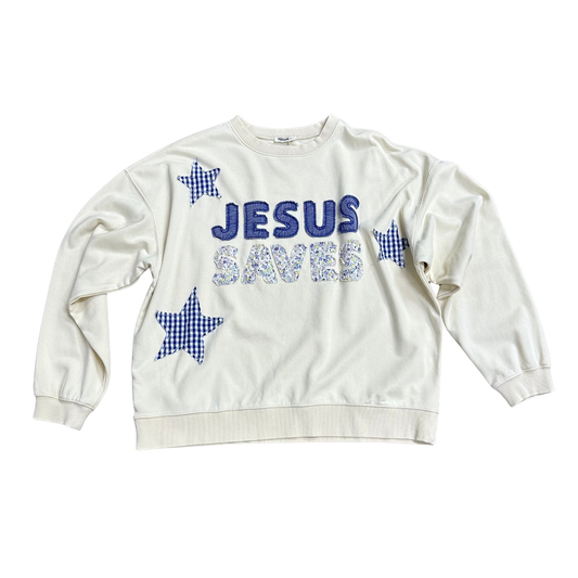 Embrace timeless style with this oat-colored long sleeve sweatshirt from Mittoshop, featuring a meaningful "Jesus Saves" graphic. The crew neck design offers classic comfort and versatility, making it an essential layering piece for any wardrobe. Crafted for durability and everyday wear, this sweatshirt combines quality construction with thoughtful design. Perfect for those seeking apparel that reflects both personal values and contemporary fashion sensibilities.