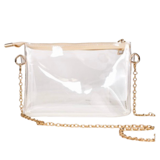 The Josie Clear Crossbody by The Royal Standard is a sleek, small purse designed for effortless style and convenience. Featuring a transparent design with elegant gold accents, this bag offers easy access to essentials while maintaining a polished look. Its compact size makes it perfect for hands-free outings, combining practicality with refined aesthetics. Ideal for those who value both function and fashion in their everyday accessories.