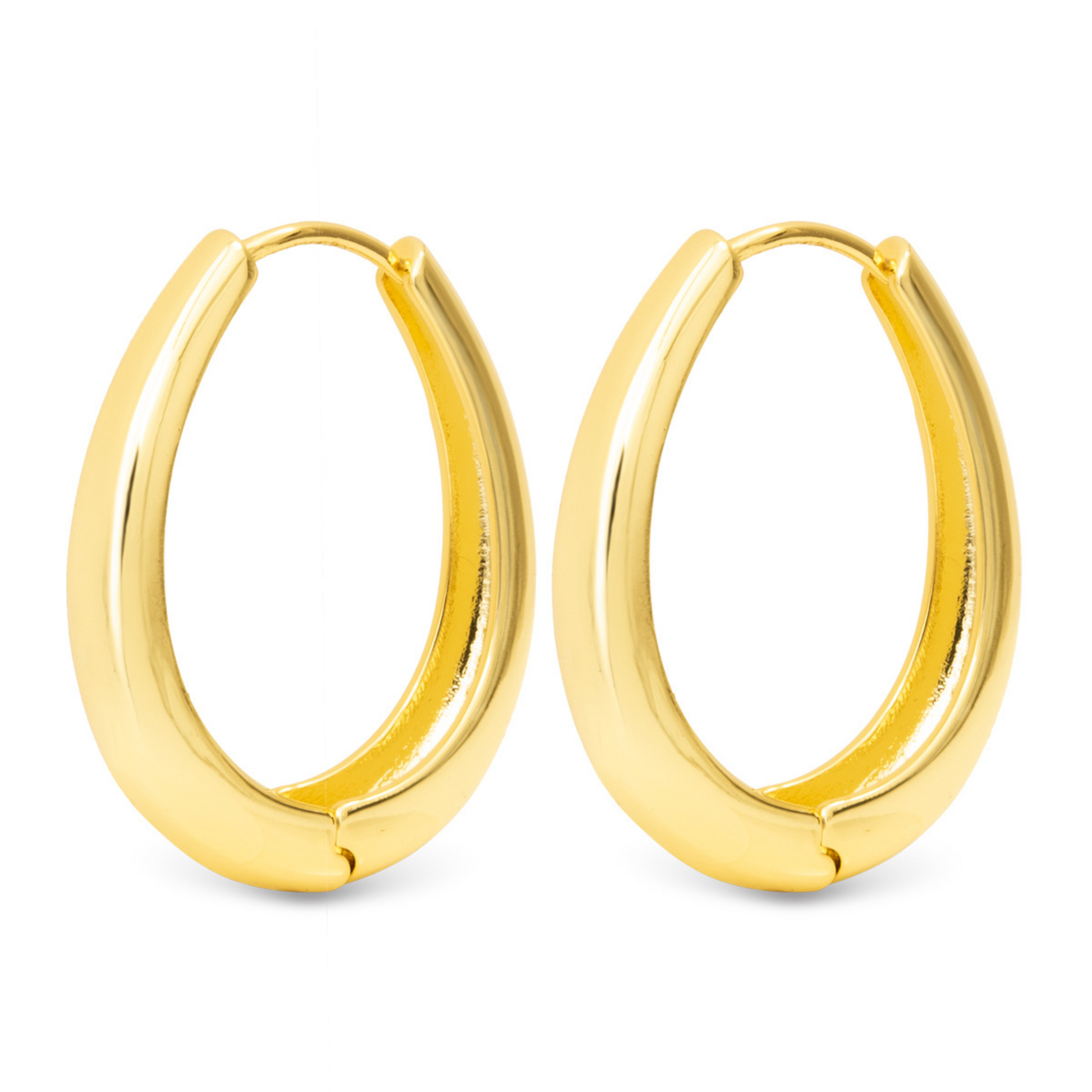 Achieve effortless elegance with the Judith Large Oval Hoops by Amanda Blu. Made with high-quality gold, these oval hoop earrings add a touch of sophistication to any outfit. Complete your look with these timeless and versatile accessories from a trusted brand.