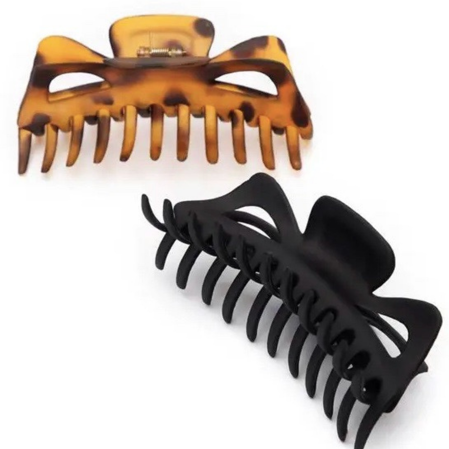 Accessorize your look with these Jumbo Classic Claw Clips. This set includes a pair of stylish hair clips, each with a large size that securely holds your hair all day. Choose between the classic black and tortoise colors to suit your style.