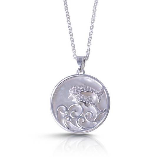 This elegant Jumping Dolphin Necklace is expertly crafted with silver and accented with sparkling rhinestones. The intricately designed dolphin adds a touch of grace and charm to any outfit. Perfect for dolphin lovers and those looking to add a touch of sophistication to their jewelry collection.