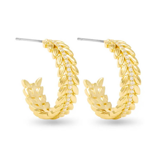 Elevate your accessory collection with the Kylie Polished Feather Hoop Earrings by Amanda Blu. Crafted in gleaming gold, these small hoops feature a delicate feather design that adds a refined touch to any outfit. Their polished finish ensures a sophisticated look, perfect for both everyday wear and special occasions. Expertly designed, these earrings combine subtle elegance with timeless style.