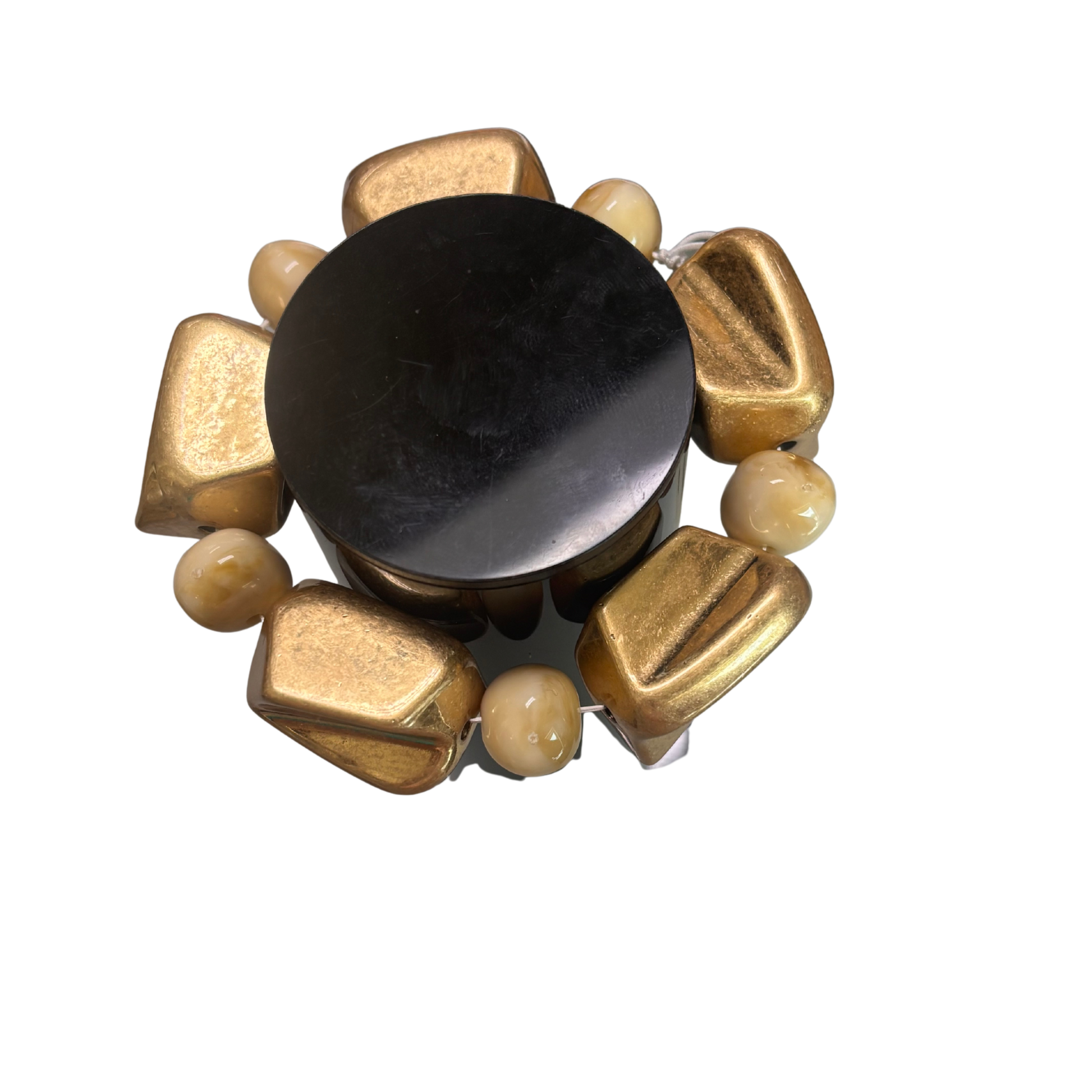 Elevate your everyday style with this stunning Large Beaded Bracelet from Perdido Gems. Crafted with oversized beads in a luxurious gold and beige combination, this stretchy bracelet offers effortless comfort and versatile elegance. The rich color palette complements any outfit, from casual to sophisticated. Perfect for layering or wearing solo, this piece brings warmth and dimension to your wrist. Slip it on and enjoy all-day wear without compromise.