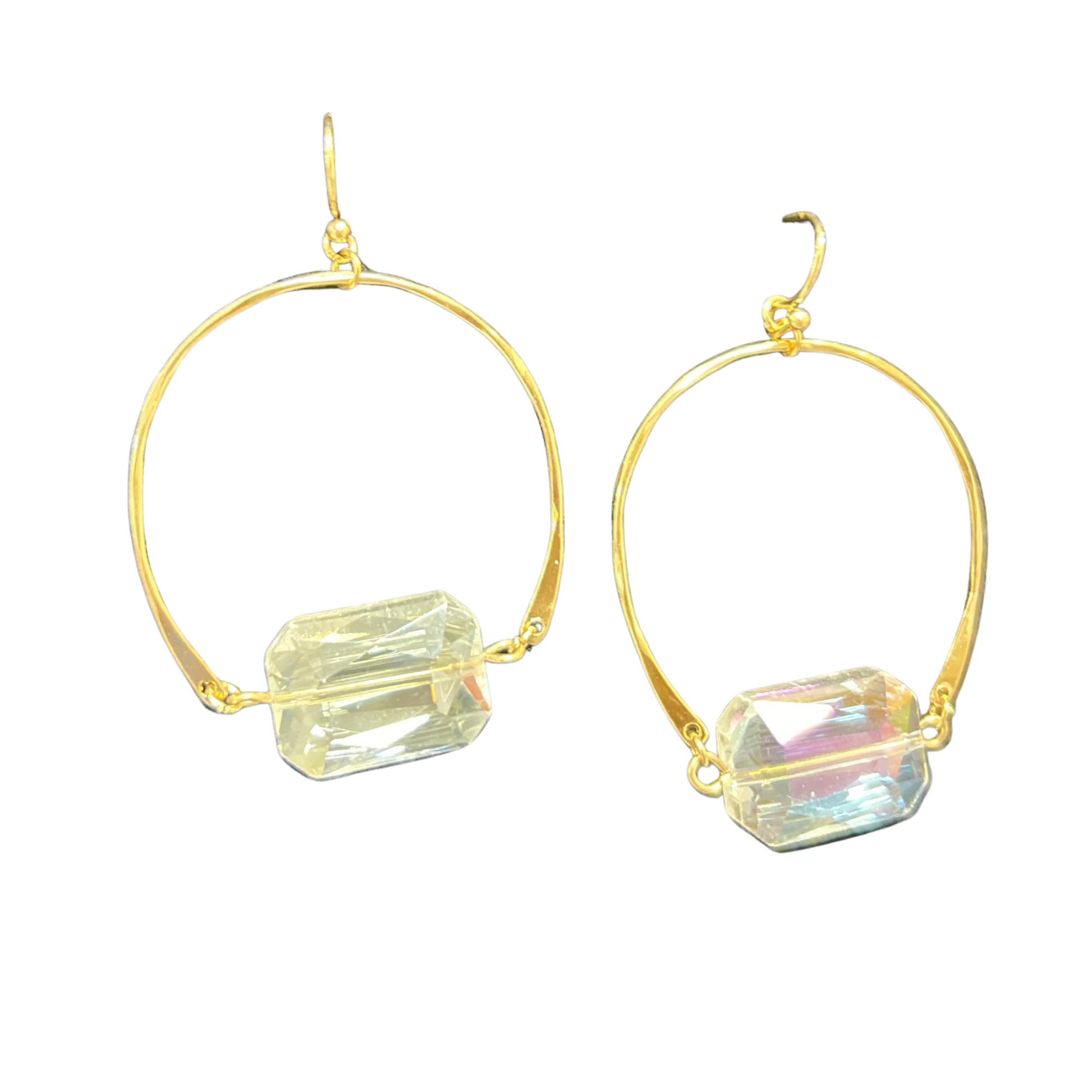 Upgrade your earring collection with our Clear Gemstone Hoops. Crafted in gold, these hoops feature iridescent gemstones that catch the light beautifully, adding a touch of elegance to any outfit. Elevate your style with these stunning and versatile hoops.