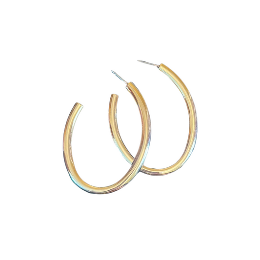 Expertly crafted by ETE, these Large Oval Hoops elevate any ensemble with their distinctive shape and luxurious gold finish. The generous proportions create a bold statement while maintaining an elegant silhouette. Perfect for both everyday sophistication and special occasions when you desire a refined yet impactful accessory.