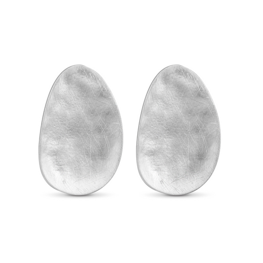 Discover a modern twist on classic stud earrings with our Luna Large Oval Studs. Crafted with a sleek matte finish, these oval shaped earrings in silver are the perfect addition to any outfit. Elevate your style with this versatile and timeless accessory.