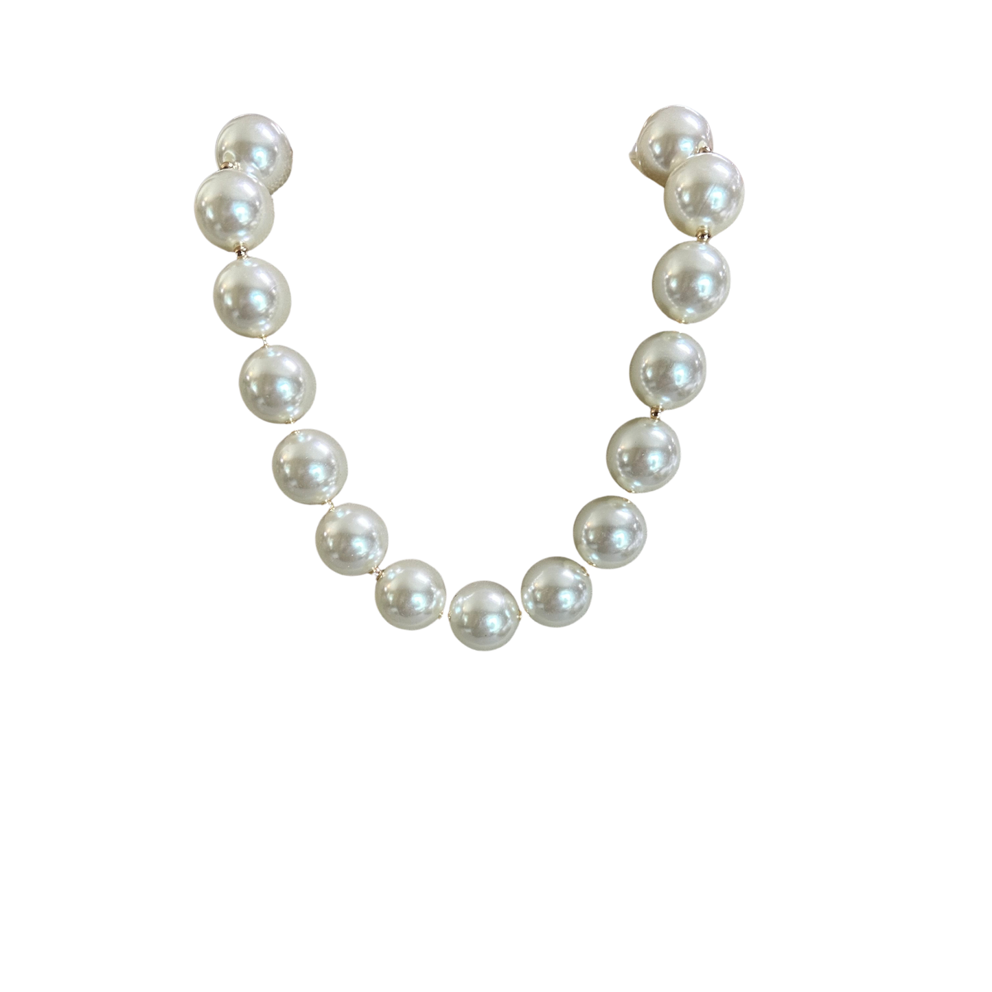Elevate your everyday style with this stunning Large Pearl Necklace from Perdido Gems. Featuring lustrous large pearls paired with delicate gold accents, this short necklace offers timeless elegance and versatility. Perfect for layering or wearing solo, it adds a touch of sophistication to any outfit. The refined design makes it an ideal choice for both casual wear and special occasions.