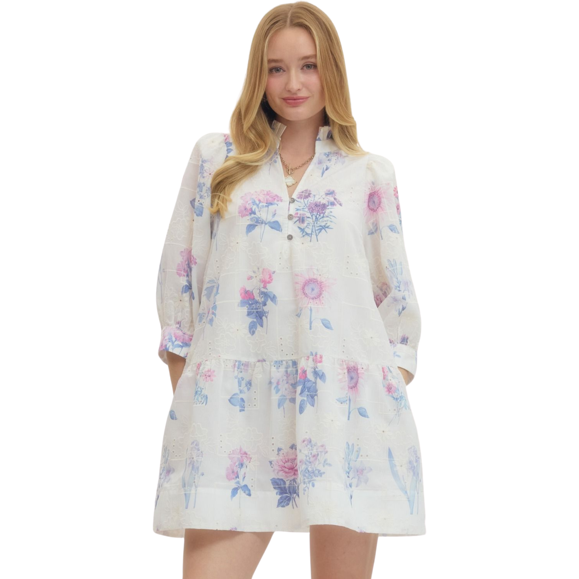 Elevate your spring wardrobe with this charming Floral Print Mini Dress by Entro. Featuring a delicate lavender floral design, this piece combines feminine style with everyday comfort. The flattering V-neckline and three-quarter length sleeves offer a sophisticated silhouette, while the mini length keeps things fresh and modern. Perfect for casual outings, brunch dates, or weekend adventures. Versatile enough to dress up with heels or down with sneakers.
