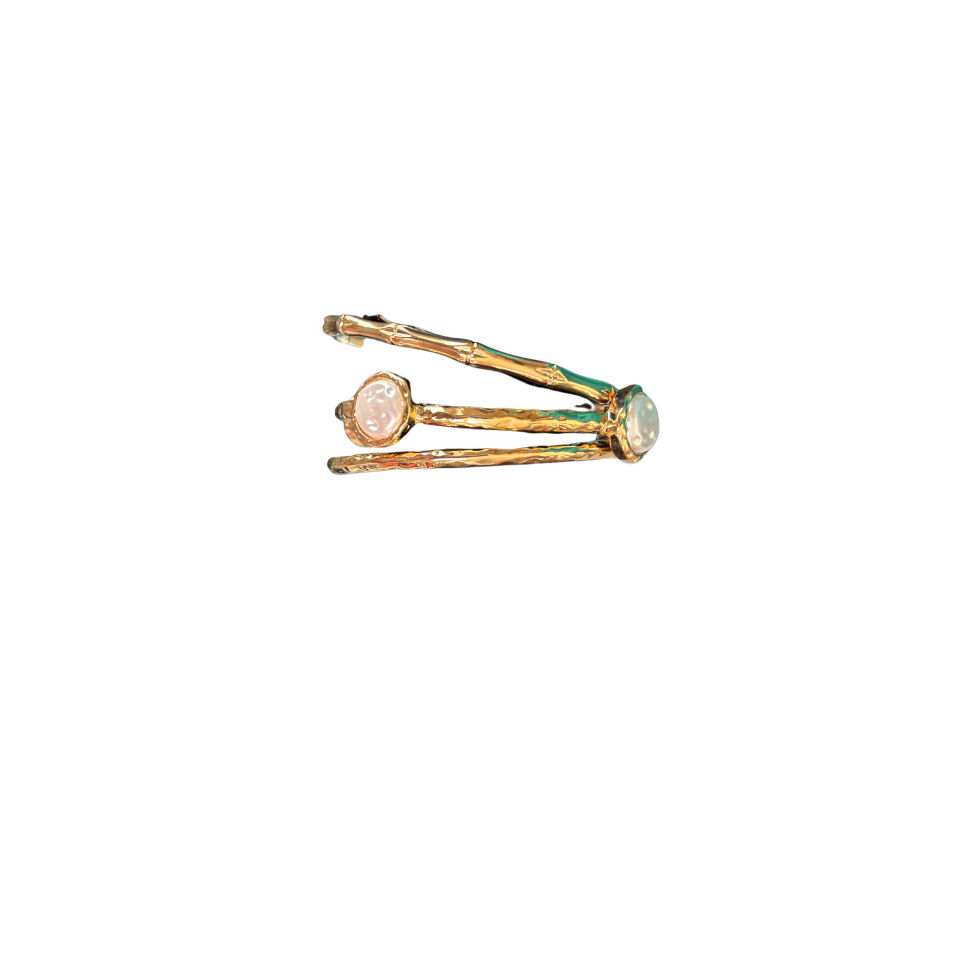 Elevate your wrist with this stunning gold layered bangle bracelet from Perdido Gems. Delicate mother of pearl accents catch the light beautifully, adding sophistication and subtle shimmer to any look. The layered design creates dimension and visual interest, perfect for stacking or wearing solo. Versatile enough for everyday wear or special occasions, this piece combines timeless elegance with modern style.