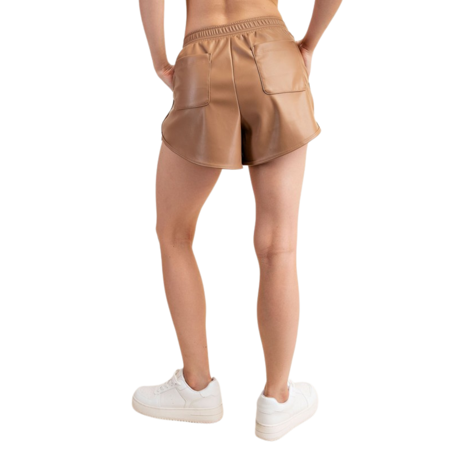 Crafted from luxuriously soft PU leather, this short offers a buttery-smooth feel against your skin. With four pockets and a stylish curved hem design, these shorts effortlessly combine functionality with fashion. The stretch elastic waistband offers versatility, allowing high or low rise to suit your mood. Embrace luxury, chic, and laid-back vibes with these versatile shorts that redefine casual elegance.