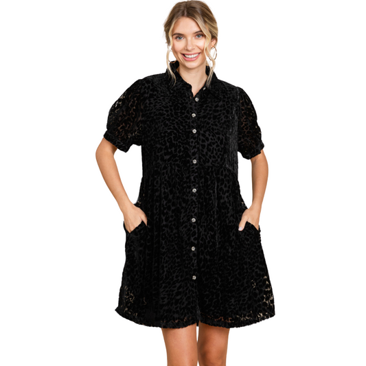 This Leopard Babydoll Dress is a stylish choice for any occasion. Made of plush velvet with a fun leopard print, it features a collared neck, side pockets, short peasant sleeves, and band cuffs. The perfect combination of comfort and sophistication, this dress is a must-have for any fashion-forward individual.