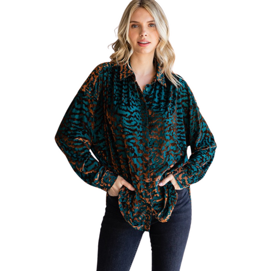 This stylish Velvet Leopard Top is designed for a sophisticated look. Featuring a collared neck, back wrinkled detail, and buttoned cuffs, this plus size top in hunter green is crafted from lightweight, unlined velvet for a comfortable fit. Perfect for any occasion.