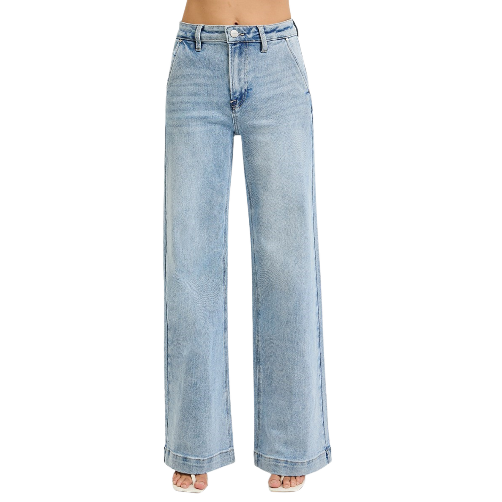 These High Rise Wide Leg Jeans by Risen offer a modern silhouette with a relaxed yet flattering fit. Crafted in a light wash, they feature wide legs that provide comfort and movement. Slanted pockets add a functional detail while enhancing the streamlined look. Ideal for stylish everyday wear, these jeans balance classic denim appeal with contemporary design.
