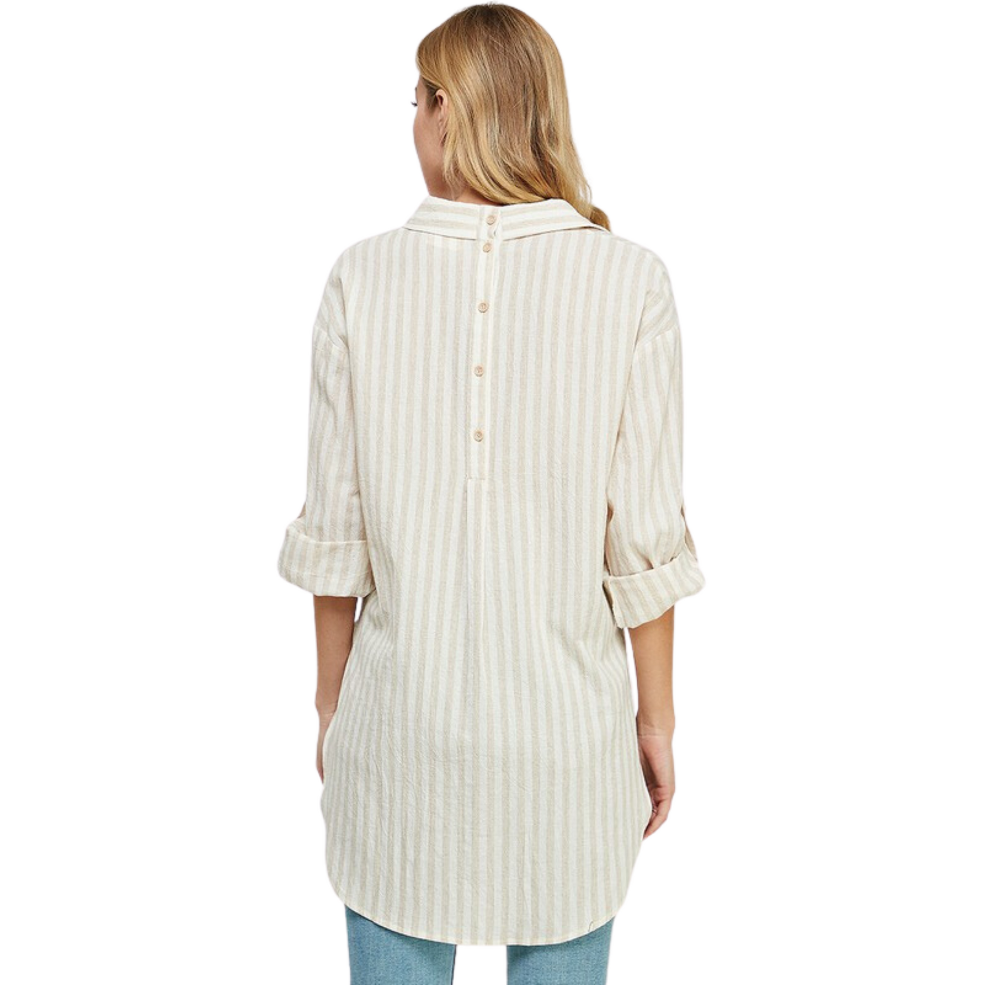 The Breezy Linen Boyfriend Shirt is the perfect mix of style and ease. Made from the best quality linen, this classic striped shirt is a stylish option for any wardrobe. The button-up design, collared neck, and contrast stripes make it a versatile piece for any occasion.