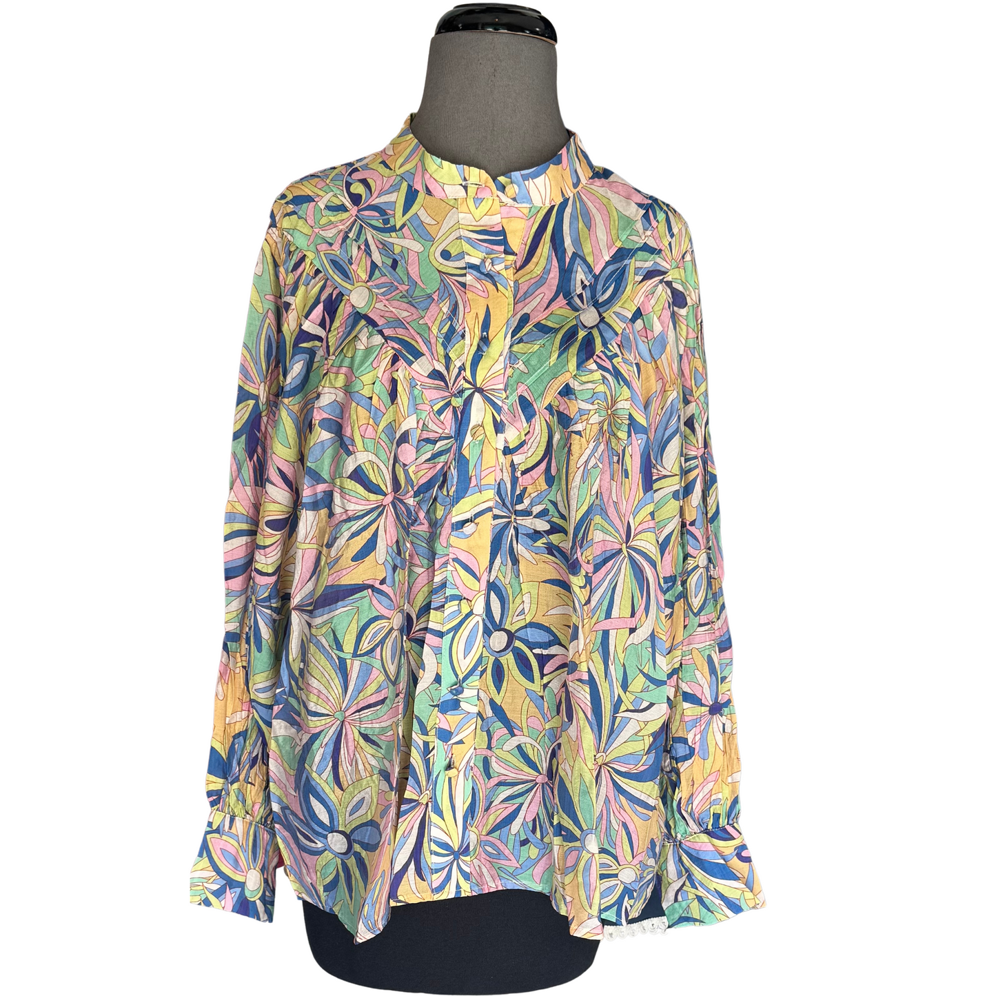 This Floral Print Long Sleeve Top features a feminine and stylish floral print, perfect for adding a pop of color to your outfit. The long sleeve design provides warmth and versatility, while the button up style offers a classic and polished look. Elevate your wardrobe with this must-have top.