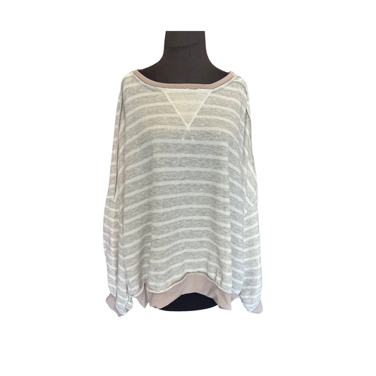 The Loose Fit Pullover Top from Haptics delivers effortless comfort with its relaxed silhouette and drop shoulder design. Crafted for plus-size figures, this crew neck long sleeve offers a flattering fit that prioritizes ease of movement without compromising style. Available in versatile Heather and Grey Stone, it's a wardrobe essential that transitions seamlessly from casual to layered looks. Quality construction ensures durability through regular wear and washing.