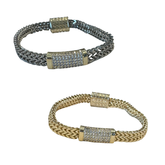 This Snake Chain Bracelet is a versatile piece of jewelry, available in either silver or gold. It features a rhinestone bar accent and a secure magnetic closure, perfect for any occasion.