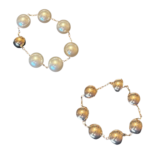 This ETE Magnetic Beaded Bracelet combines refined design with practical functionality. Bold bead accents create visual interest while the magnetic closure provides secure, convenient fastening. Available in elegant gold or pristine white, this versatile piece adapts to any wardrobe. The thoughtful engineering ensures durability and comfort for daily wear, making it an essential accessory for the discerning collector.