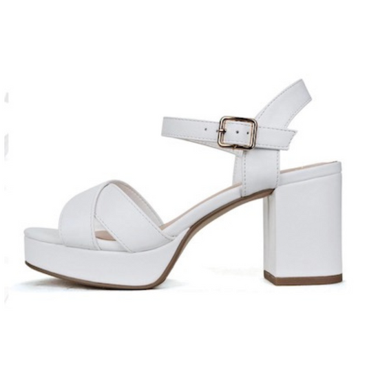 Manner fashionable sandals feature a comfortable white heel for all-day wear. Perfect for the office or a night out, these timeless sandals will complete any ensemble.