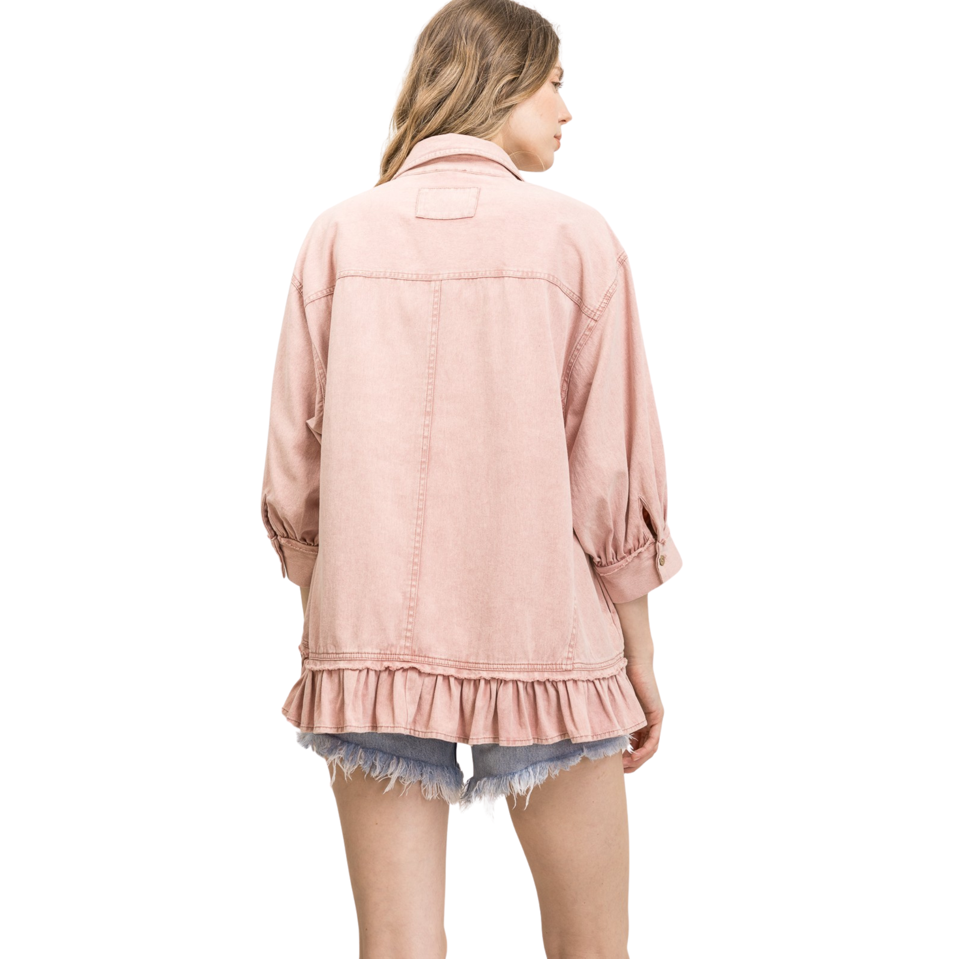 Elevate your everyday wardrobe with this sophisticated button-down blouse from Blue Velvet. Crafted in a luxurious mauve hue, this piece features a classic collared neckline and full button-front closure for effortless styling. The three-quarter length sleeves offer the perfect balance of coverage and breathability, while the charming ruffle hem adds a touch of feminine detail. 