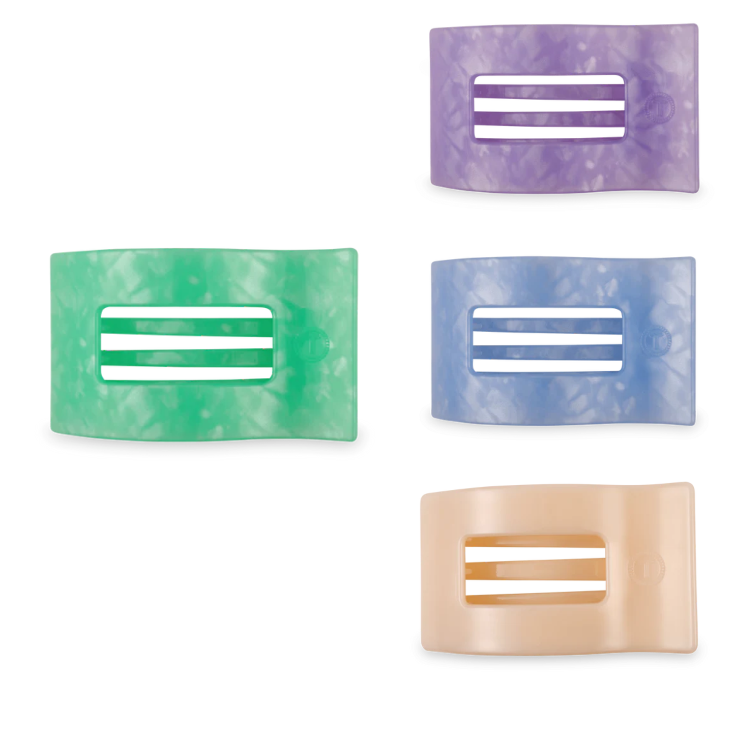The Large Flat Rectangle Hair Claw from Teleties combines sleek style with secure hold. Its flat design glides smoothly through hair without snagging, while the generous size accommodates thick and voluminous styles. Available in a variety of colors to match your look, this durable claw clip is perfect for everyday wear, workouts, or casual updos. A versatile essential for any hair care routine.