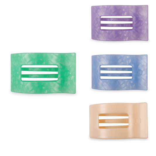 The Large Flat Rectangle Hair Claw from Teleties combines sleek style with secure hold. Its flat design glides smoothly through hair without snagging, while the generous size accommodates thick and voluminous styles. Available in a variety of colors to match your look, this durable claw clip is perfect for everyday wear, workouts, or casual updos. A versatile essential for any hair care routine.