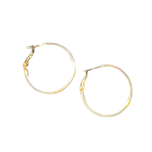 Expertly crafted with shimmering gold, these Medium Hoop Earrings are a timeless addition to any jewelry collection. Perfect for adding a touch of elegance to any outfit, these hoop earrings are versatile and can be worn for any occasion. Trust in the quality and style of these must-have earrings.