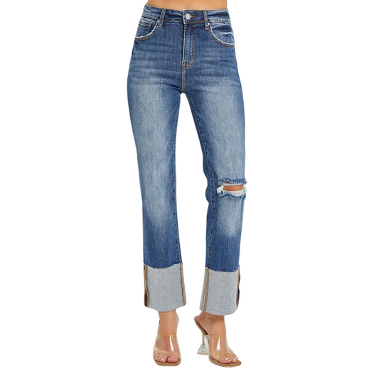 These High Rise Ankle Cuffed Jeans by Risen offer a chic addition to your denim collection. The wide cuffed hem and medium wash add a touch of style, while the distressed details give a trendy edge. Elevate your look with these expertly crafted jeans.