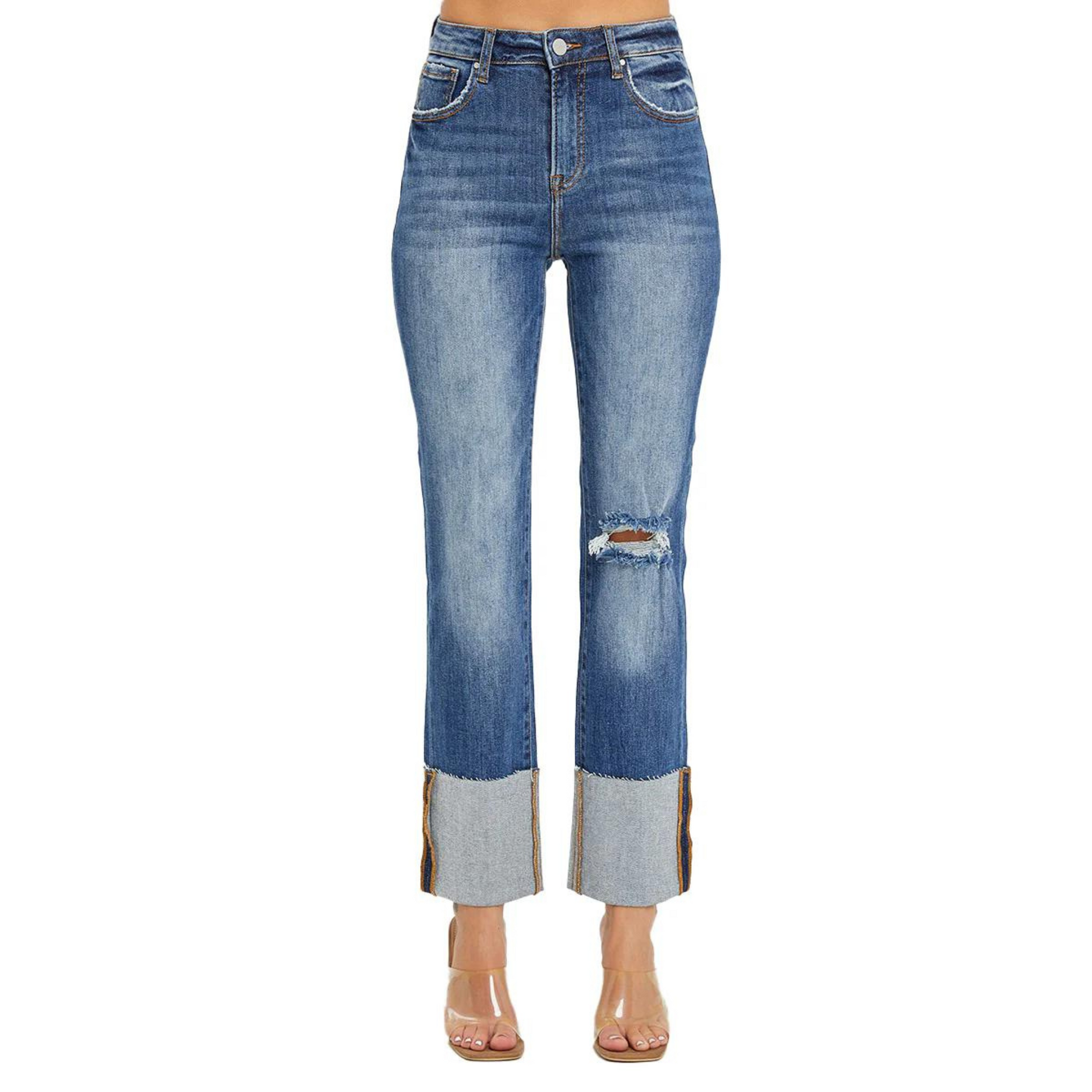 These High Rise Ankle Cuffed Jeans by Risen offer a chic addition to your denim collection. The wide cuffed hem and medium wash add a touch of style, while the distressed details give a trendy edge. Elevate your look with these expertly crafted jeans.