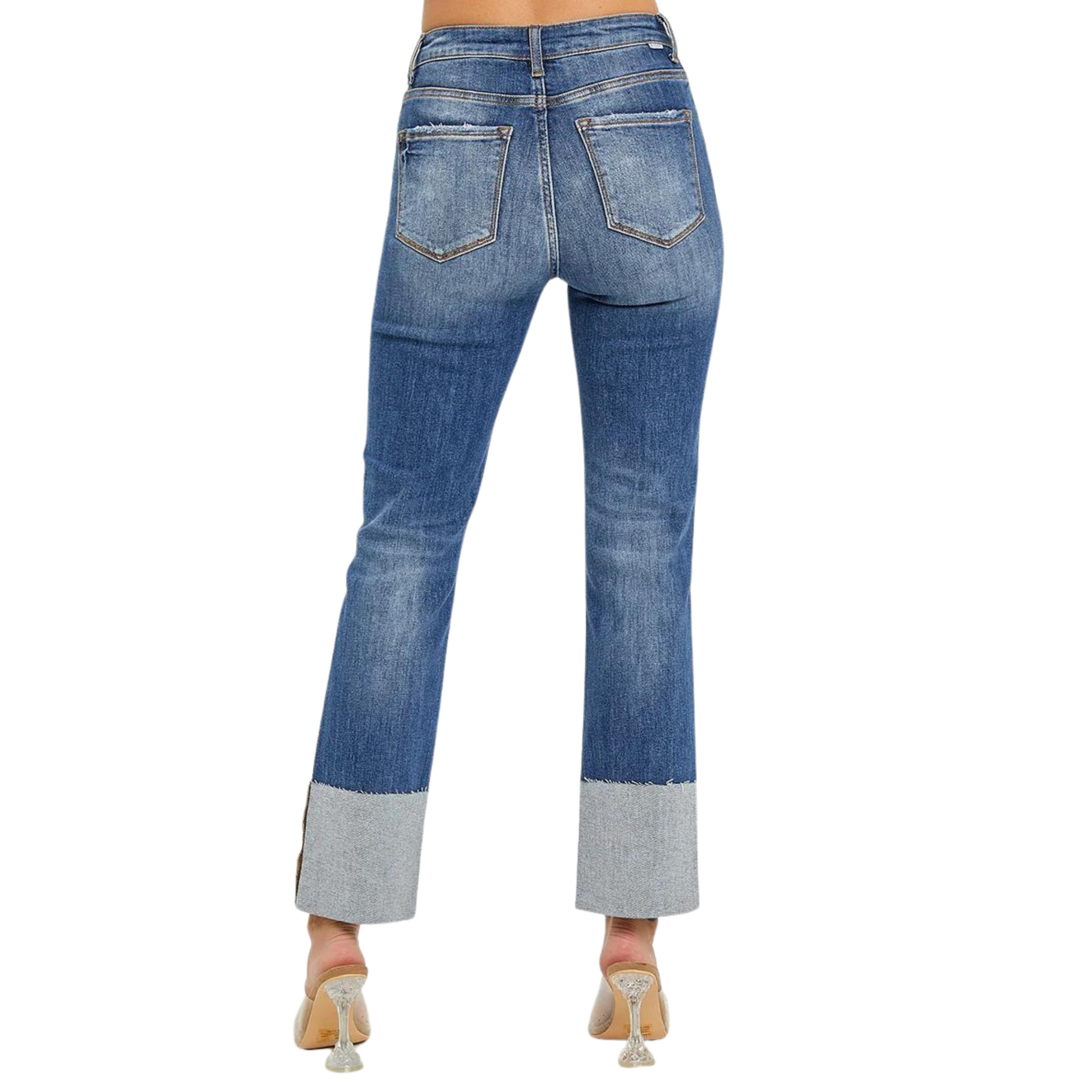 These High Rise Ankle Cuffed Jeans by Risen offer a chic addition to your denim collection. The wide cuffed hem and medium wash add a touch of style, while the distressed details give a trendy edge. Elevate your look with these expertly crafted jeans.