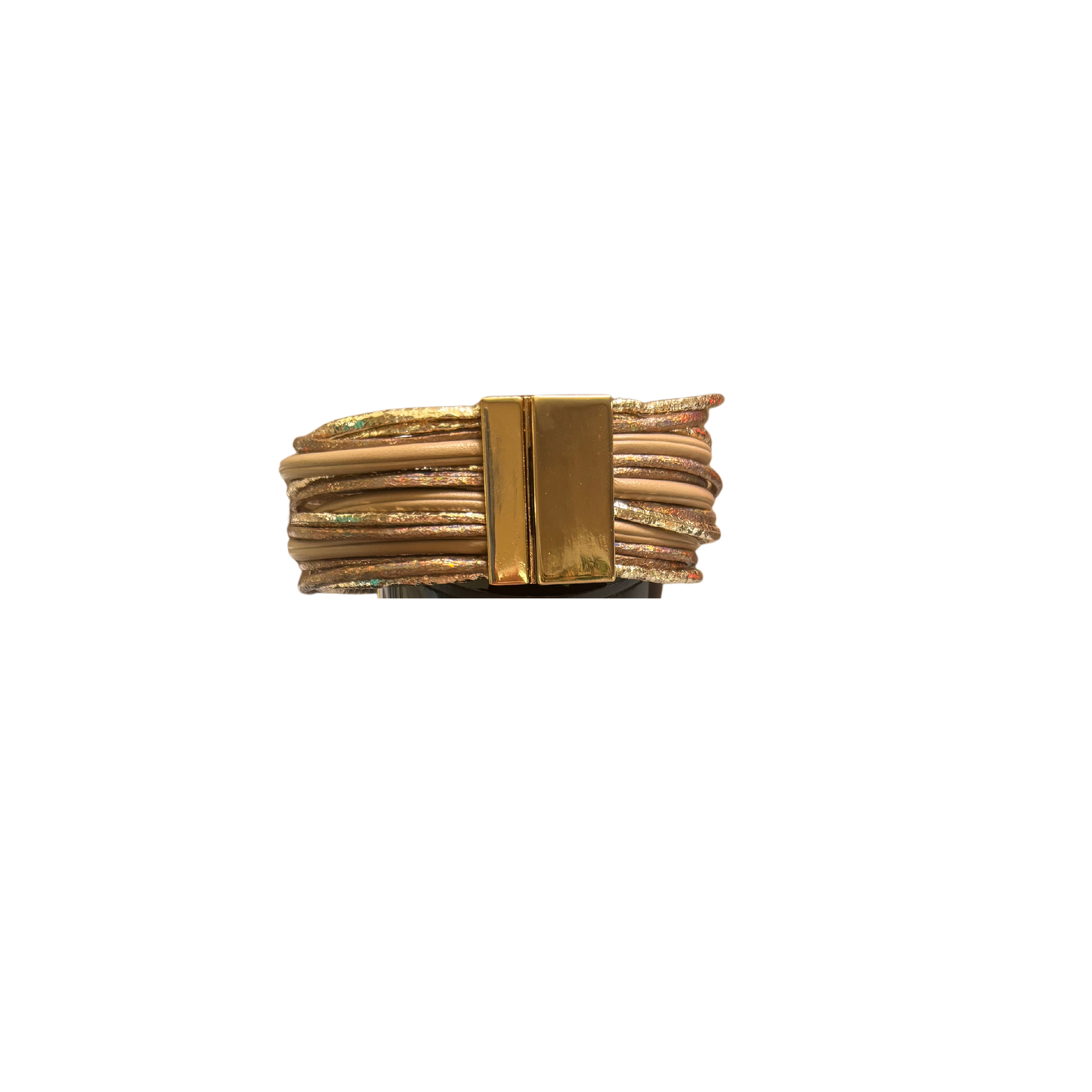 Elevate your wrist with this stunning Metallic Leather Bracelet by Perdido Gems. Crafted from luxurious metallic leather in a sophisticated taupe tone, this piece combines modern elegance with timeless appeal. The secure gold fastener adds a refined finishing touch, making it perfect for both everyday wear and special occasions. A versatile accessory that effortlessly transitions from casual to formal settings.