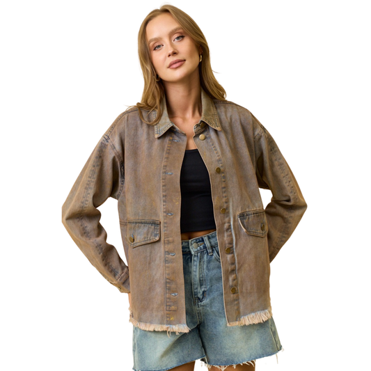 The Doe & Rae Metallic Chintz Denim Jacket combines classic denim construction with contemporary edge. Crafted in dark grey with an ice wash finish, this button-up piece features subtle metallic threading that catches light with every movement. The structured fit and timeless silhouette make it versatile enough for layering over casual basics or dressing up your favorite tee. A wardrobe essential that bridges vintage charm with modern sophistication.