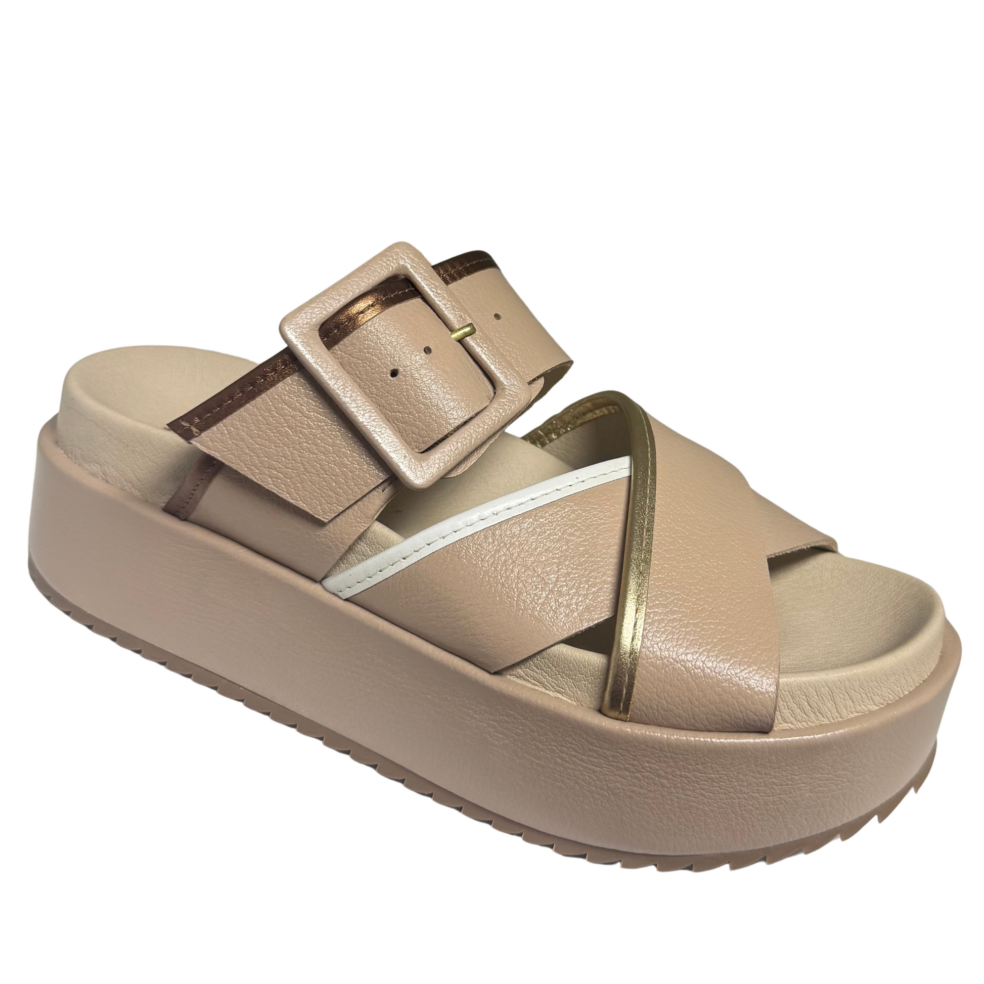 Experience comfort and style with Micah sandals by Matisse. The slide-on design and platform provide effortless wear, while the nude color adds a touch of elegance. Crafted by the renowned brand, these sandals are a must-have for any wardrobe.