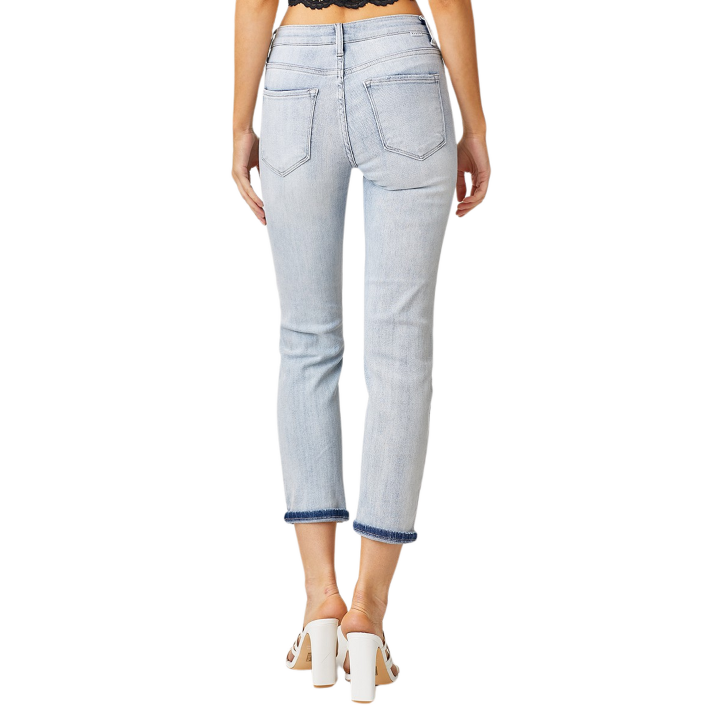 These Mid Rise Cropped Girlfriend Jeans feature a light wash and a midrise fit, making them a versatile addition to any wardrobe. The cropped cut adds a modern touch, while the midrise provides a comfortable and flattering fit. Dress them up or down for effortless style.